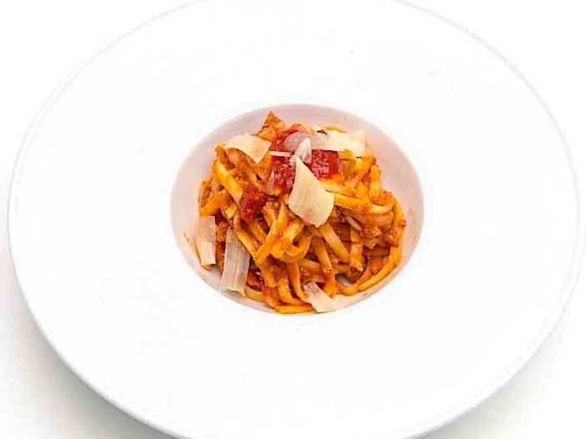 Made with spaghetti, ground beef, celery, onions, carrot, shaved parmesan cheese and tomato sauce. Contains Dairy.