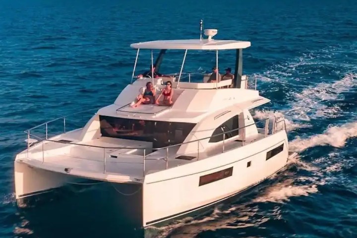 Aerial view of 43′ Leopard boat cruising Miami Beach waters