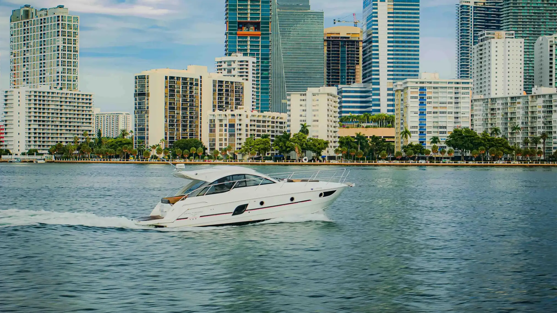 38′ Beneteau side‑profile cruising Key Biscayne