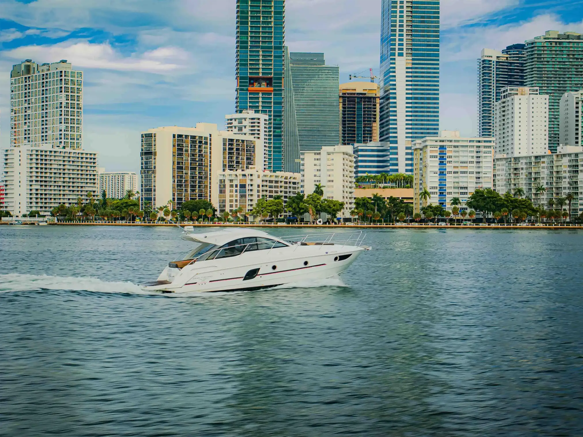 38′ Beneteau side‑profile cruising Key Biscayne