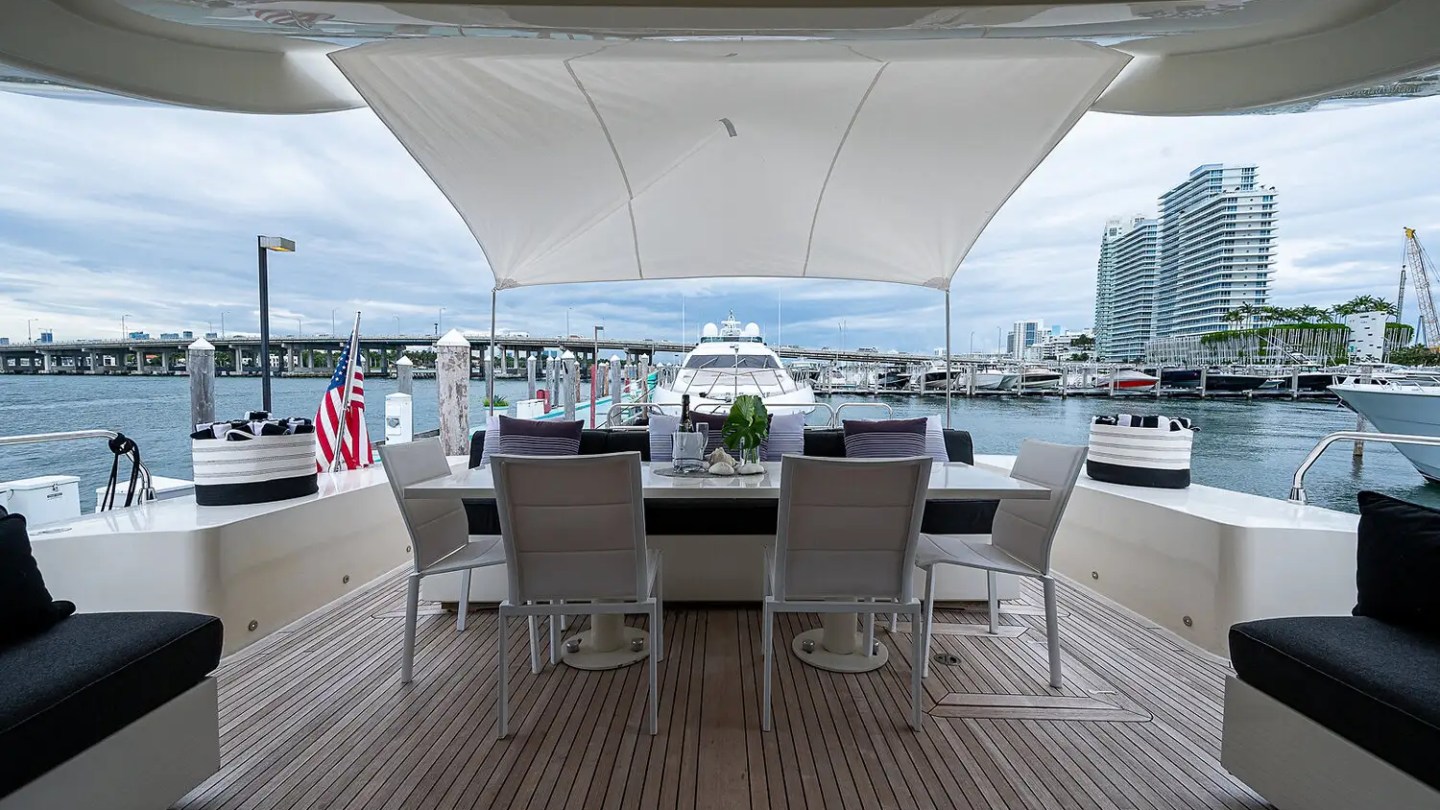 Aft dining setup on 101′ Leopard Miami