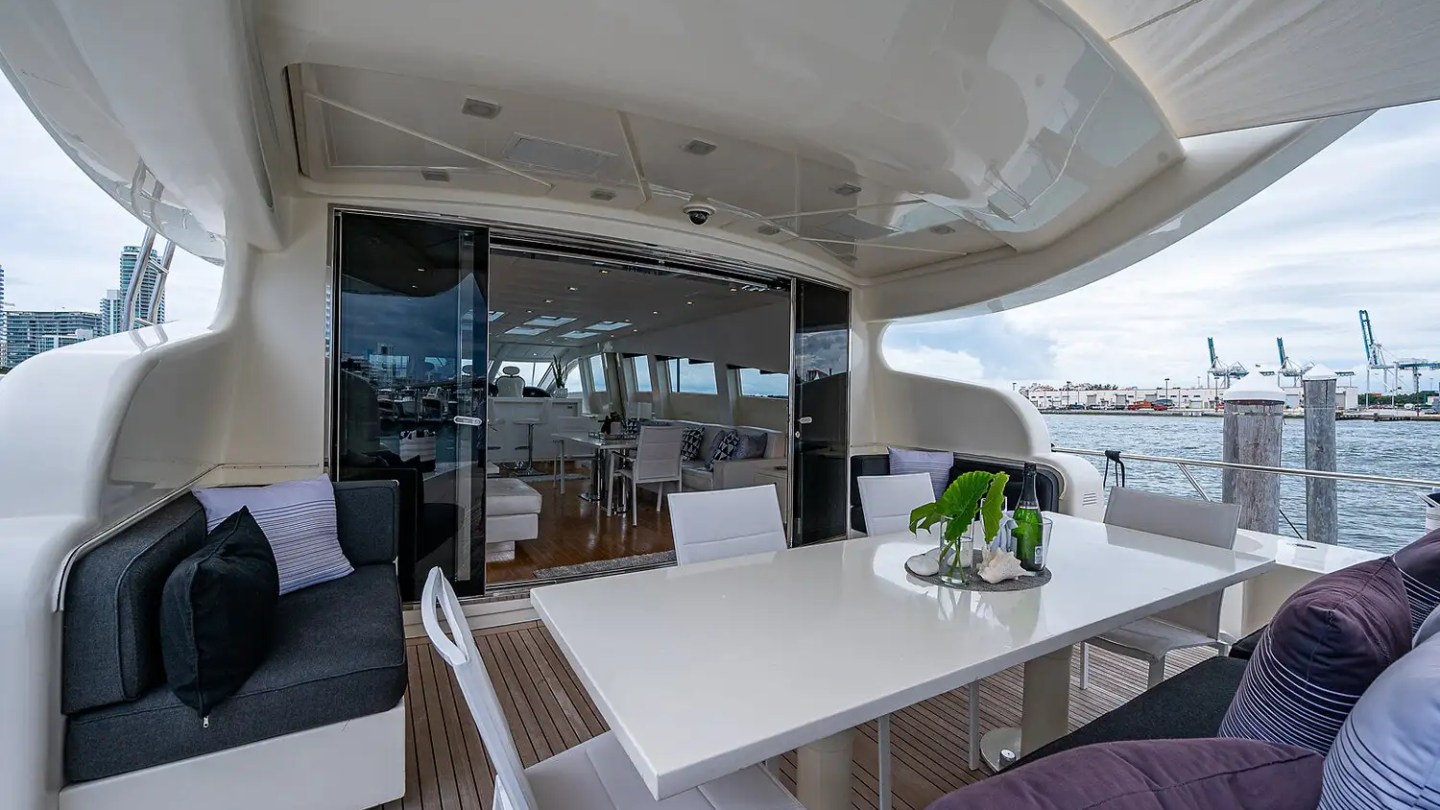 Aft deck social scene on 101′ Leopard Miami