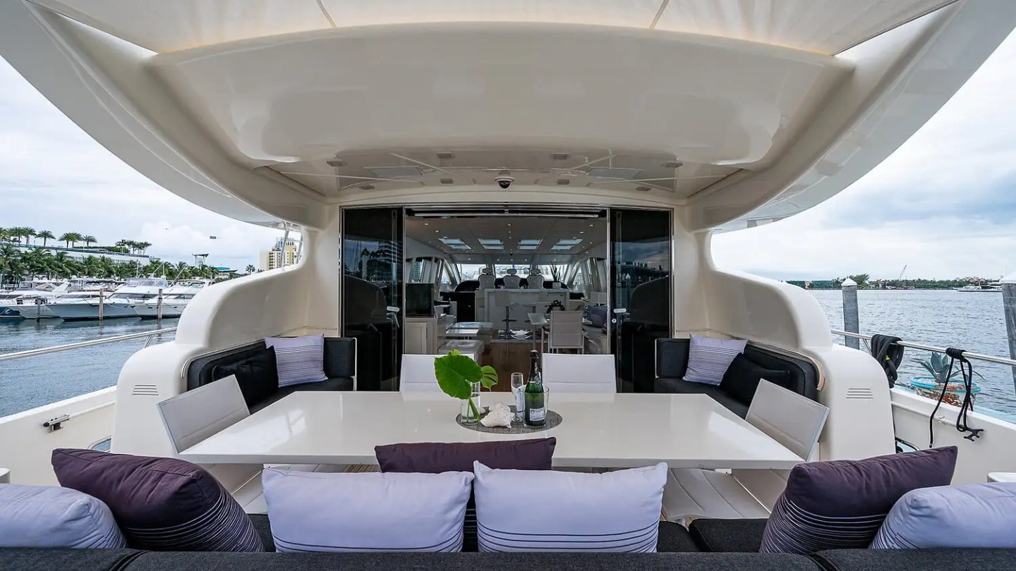 Aft deck sofa lounge on 101′ Leopard Miami