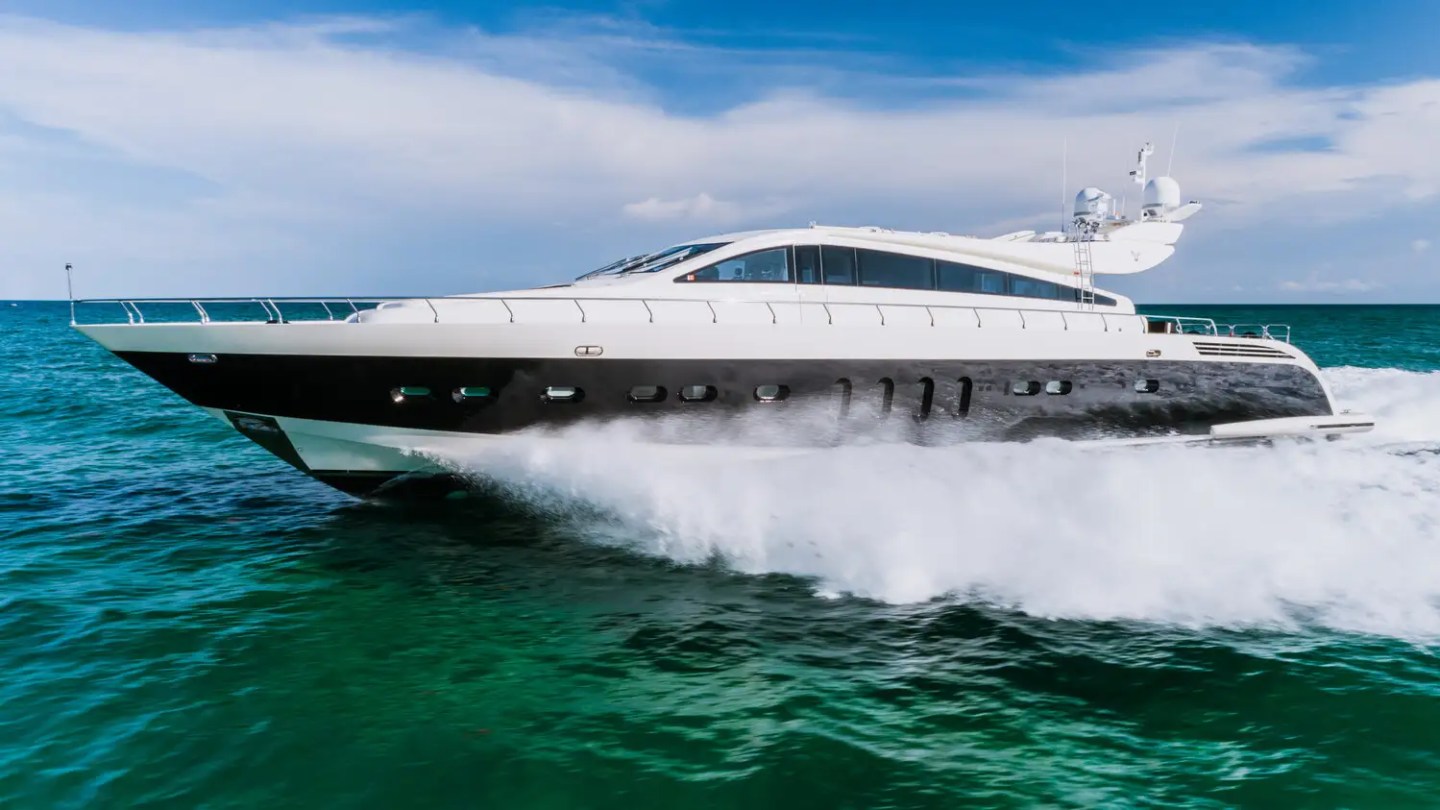 Aerial side pass of 101′ Leopard Miami