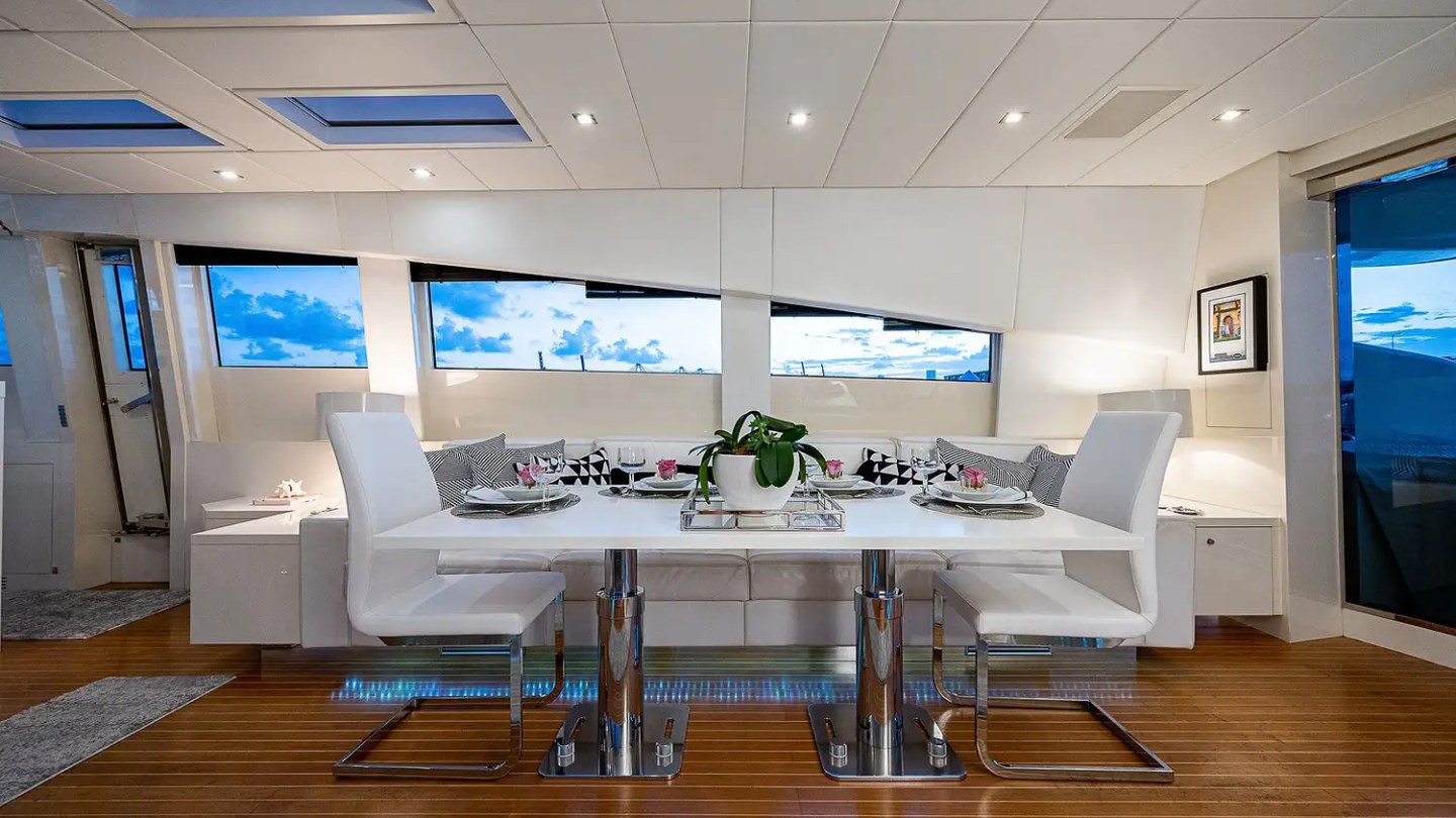 Interior dining table on 101′ Leopard Miami