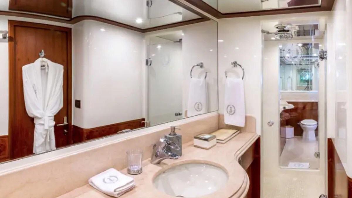 Master stateroom king bed on 103′ Johnson Key Biscayne