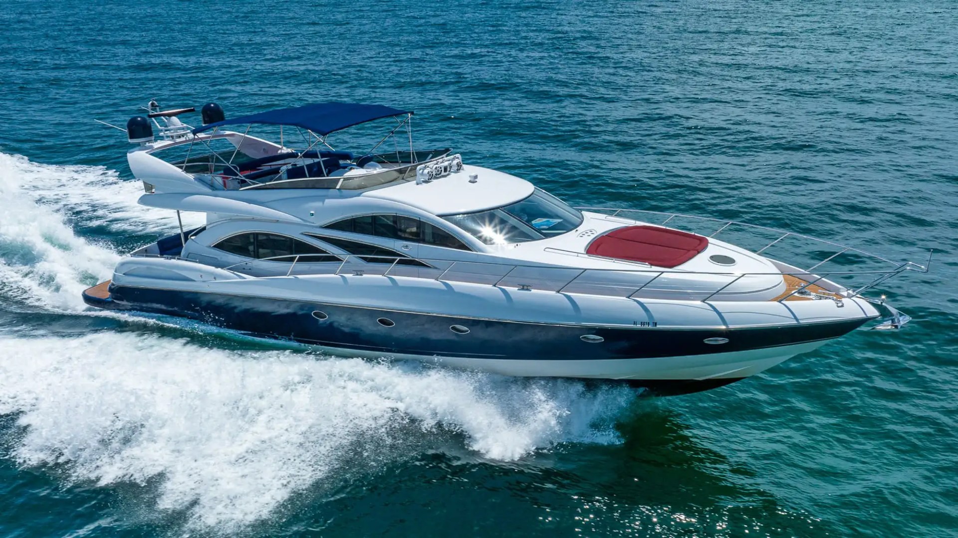 80′ Sunseeker side-profile cruising Miami