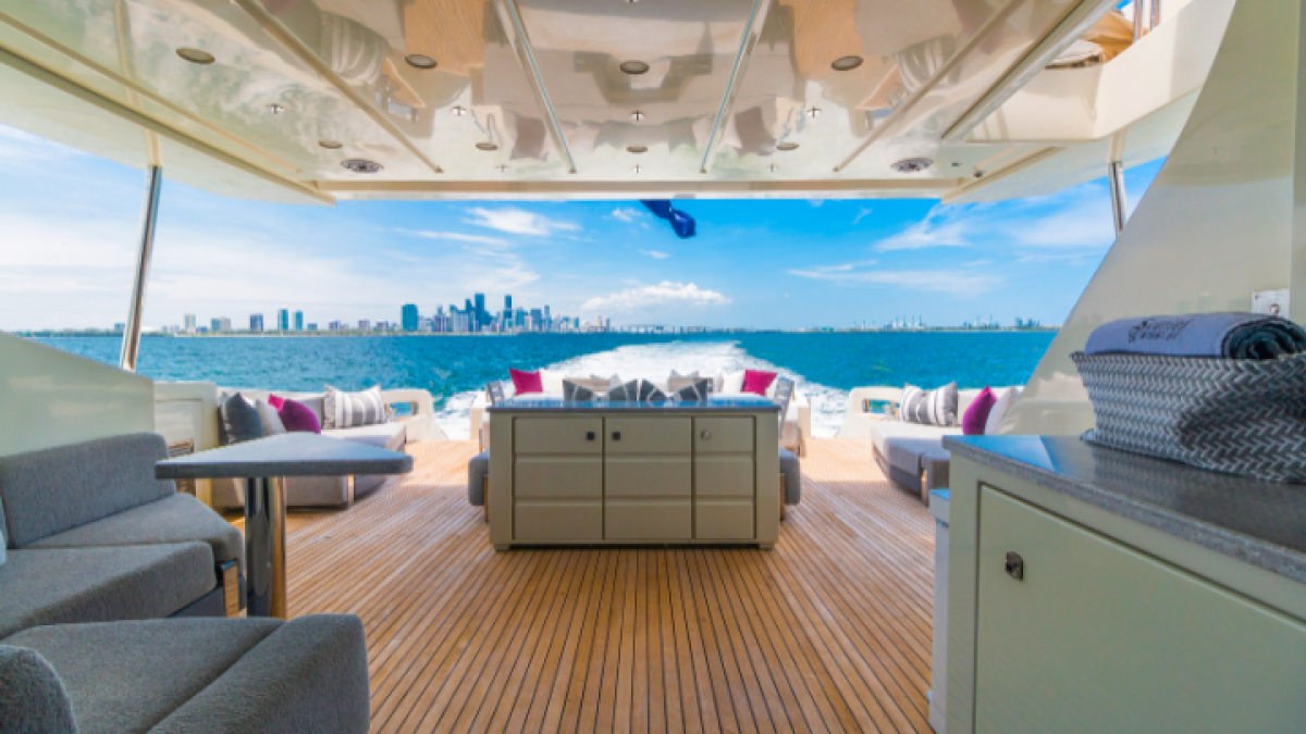 Aft deck relaxation lounge on 103′ Azimut Miami