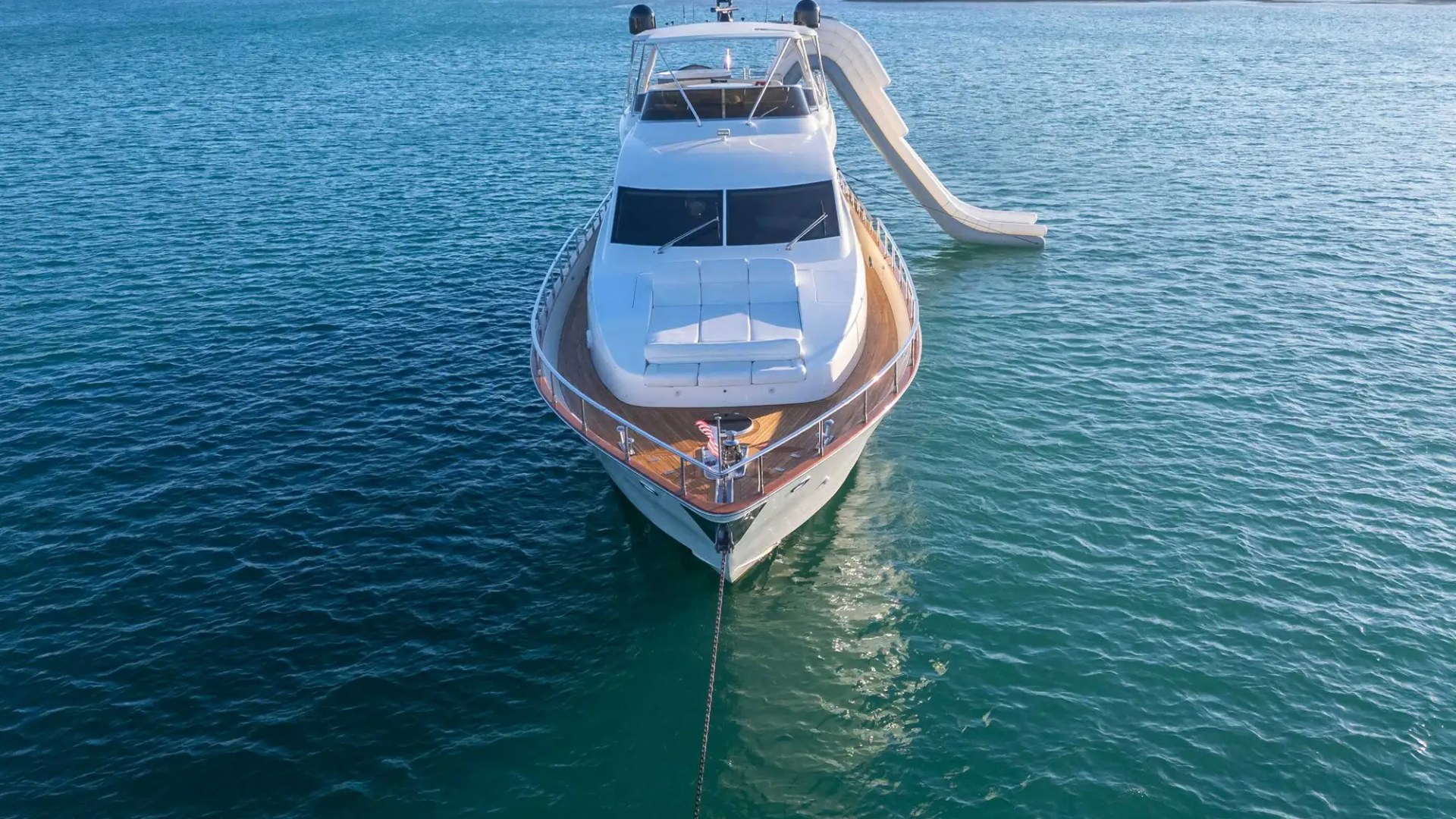 90' Azimut - Yacht Rental in Miami Beach, 90' Azimut yacht charter aerial bow view Miami Beach Biscayne Bay slide