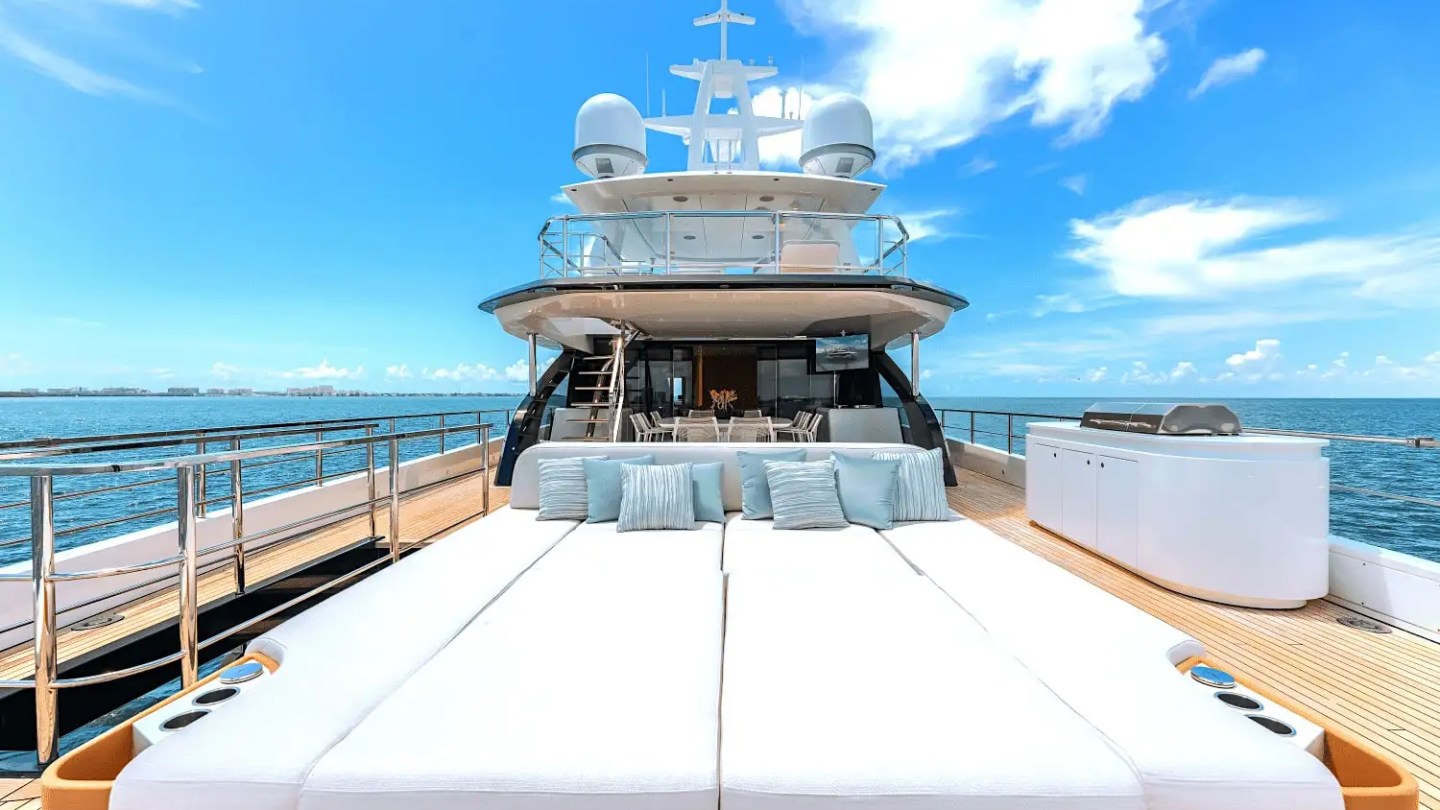 Aft deck tanning sun pads on 118′ Azimut Miami