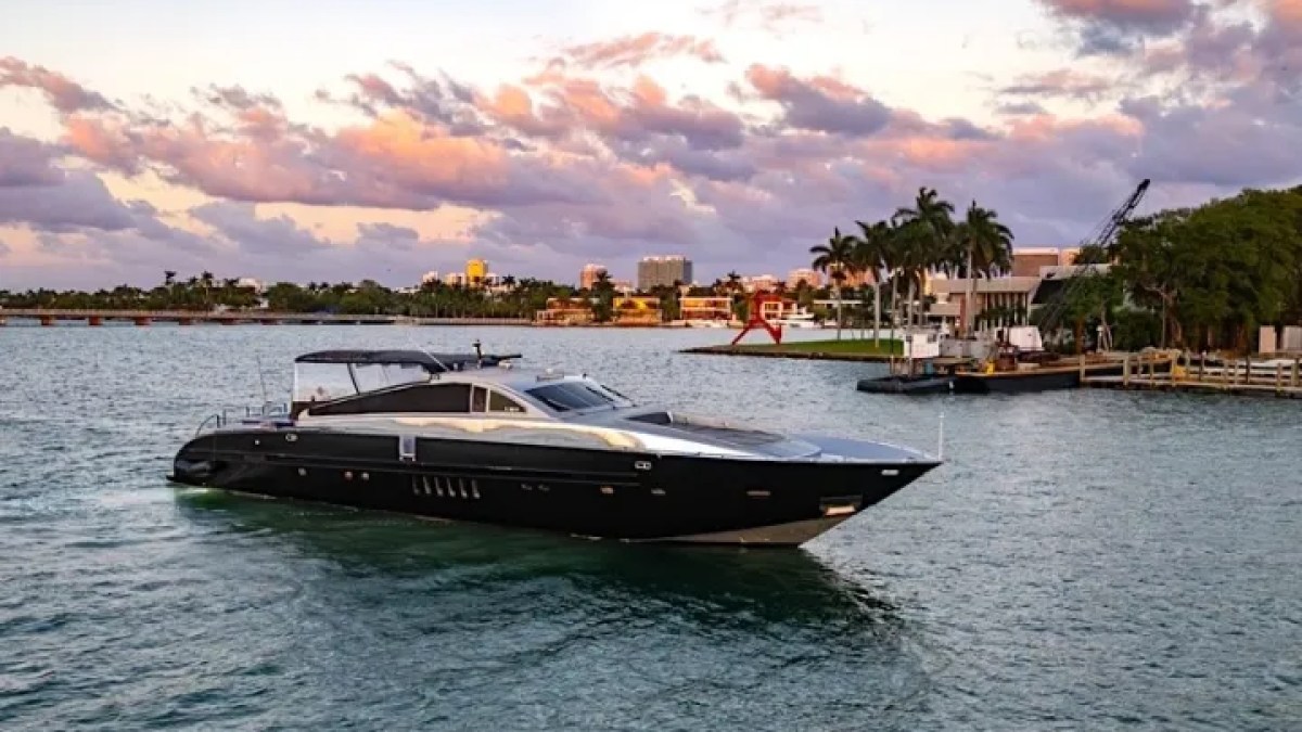 Wide drone angle side view of 94′ Leopard Miami