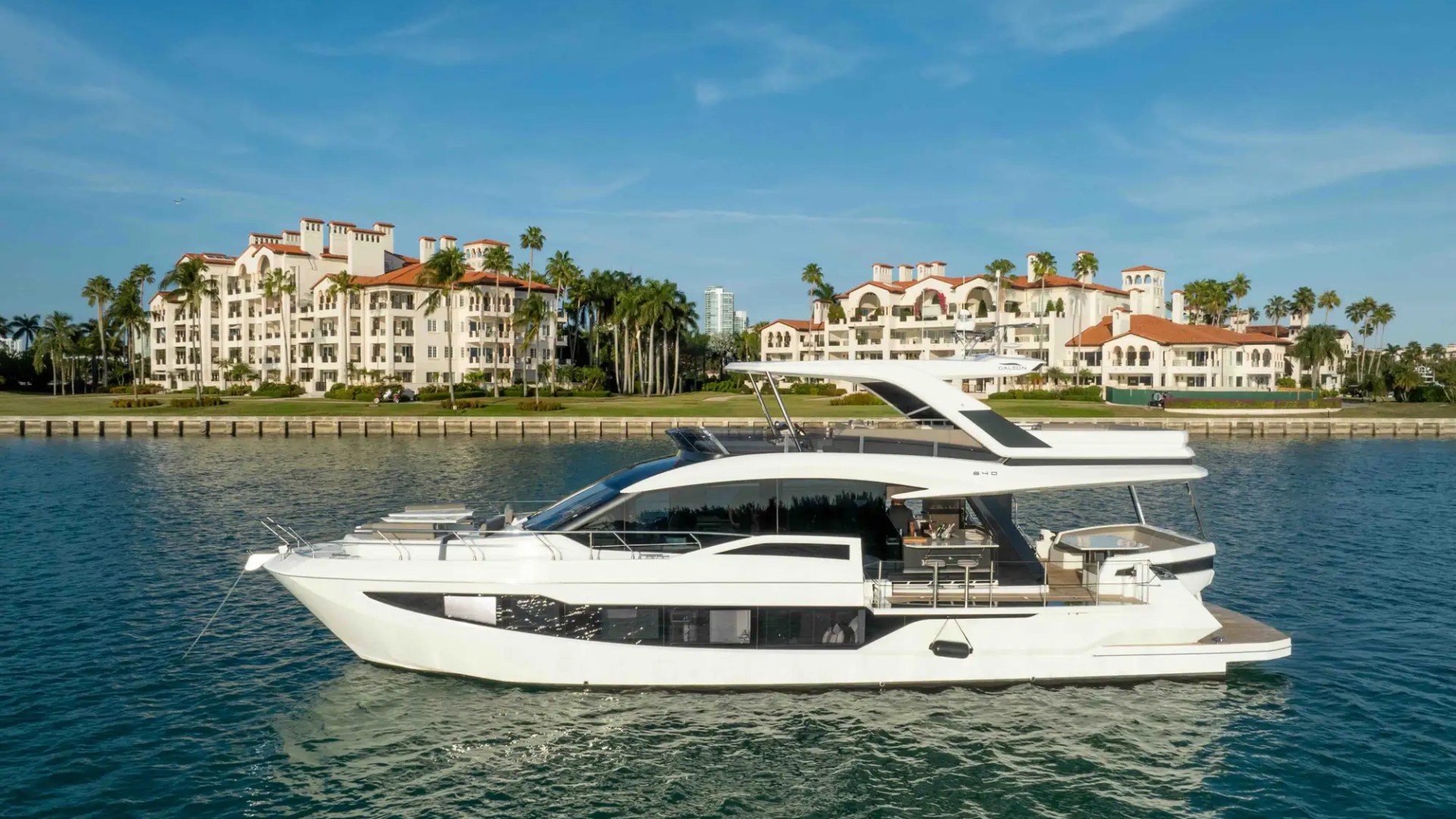 68' Galeon luxury yacht charter Miami Beach aerial side profile cruising Biscayne Bay