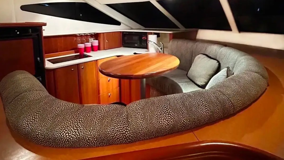 46′ Silverton boat interior salon with seating and windows