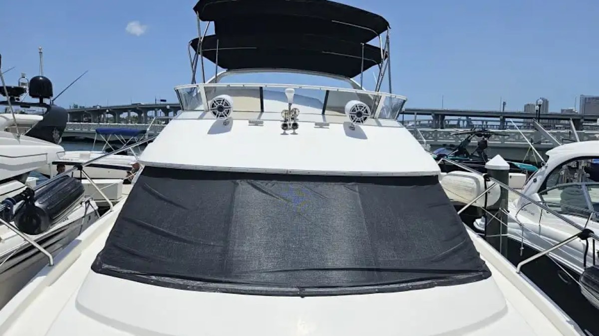 46' Silverton boat docked at Miami Beach marina