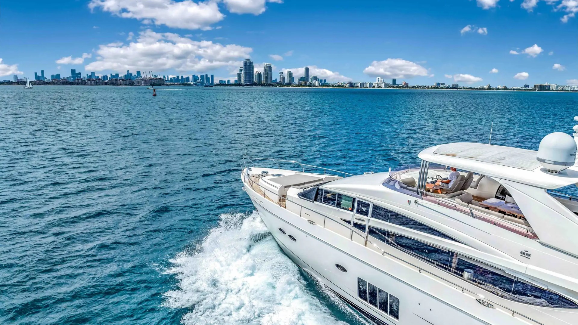 88' Princess yacht charter cruising Miami Beach skyline Biscayne Bay