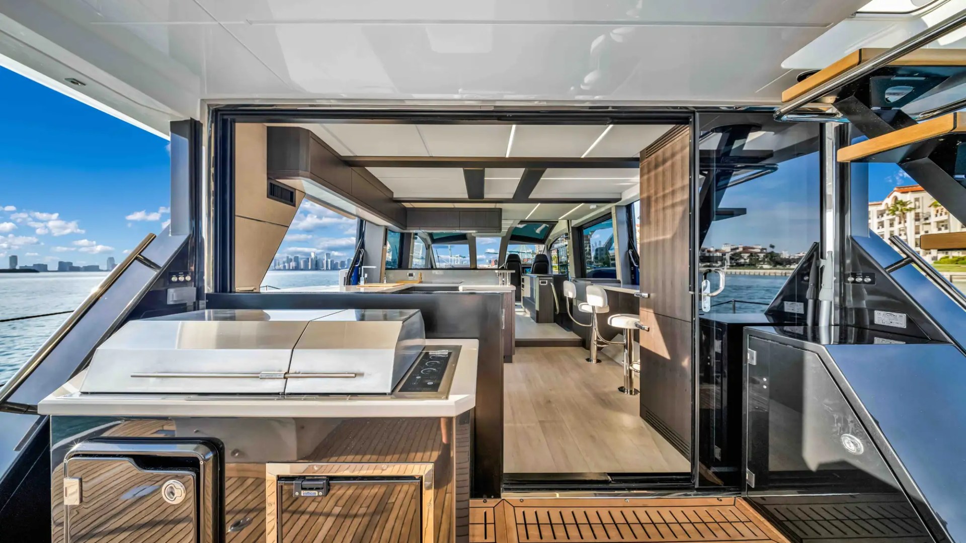 68' Galeon yacht charter Miami Beach aft deck grill and salon entrance