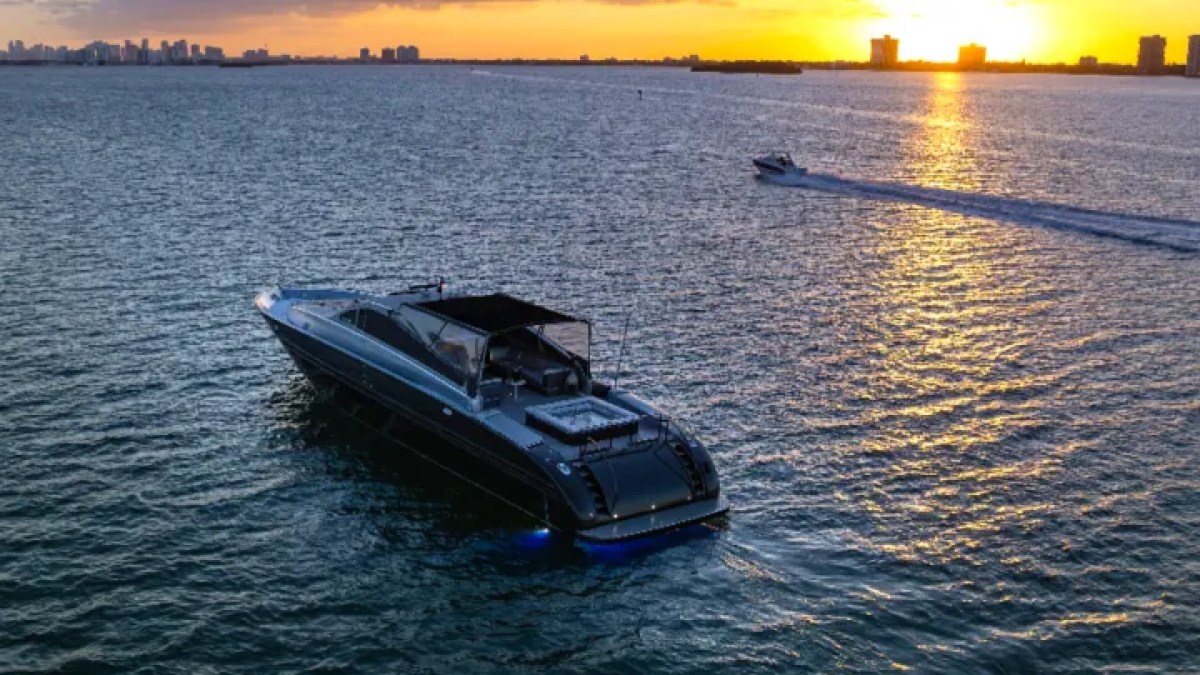 Side aerial glide shot of 94′ Leopard Miami