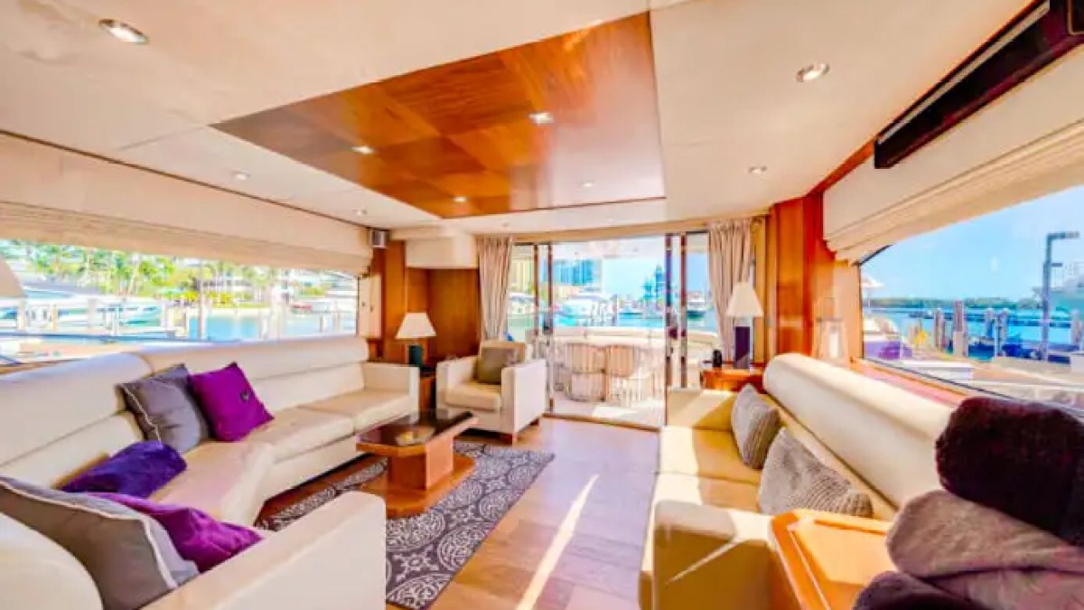 75' Sunseeker yacht charter luxury salon interior with panoramic windows in Miami Beach