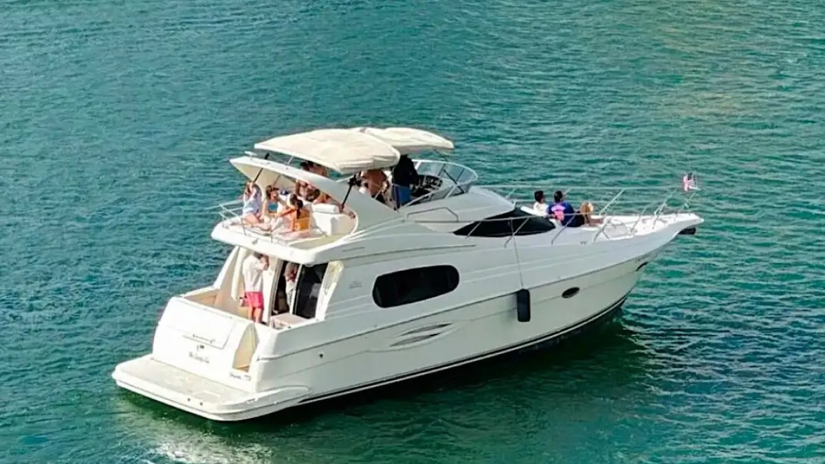 46′ Silverton boat drone shot anchored off Miami shore