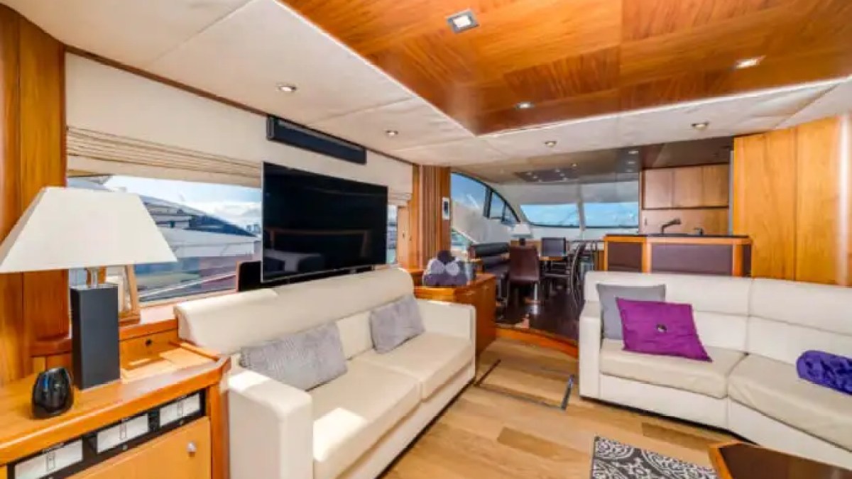 75' Sunseeker yacht charter luxury salon seating with entertainment area in Miami Beach