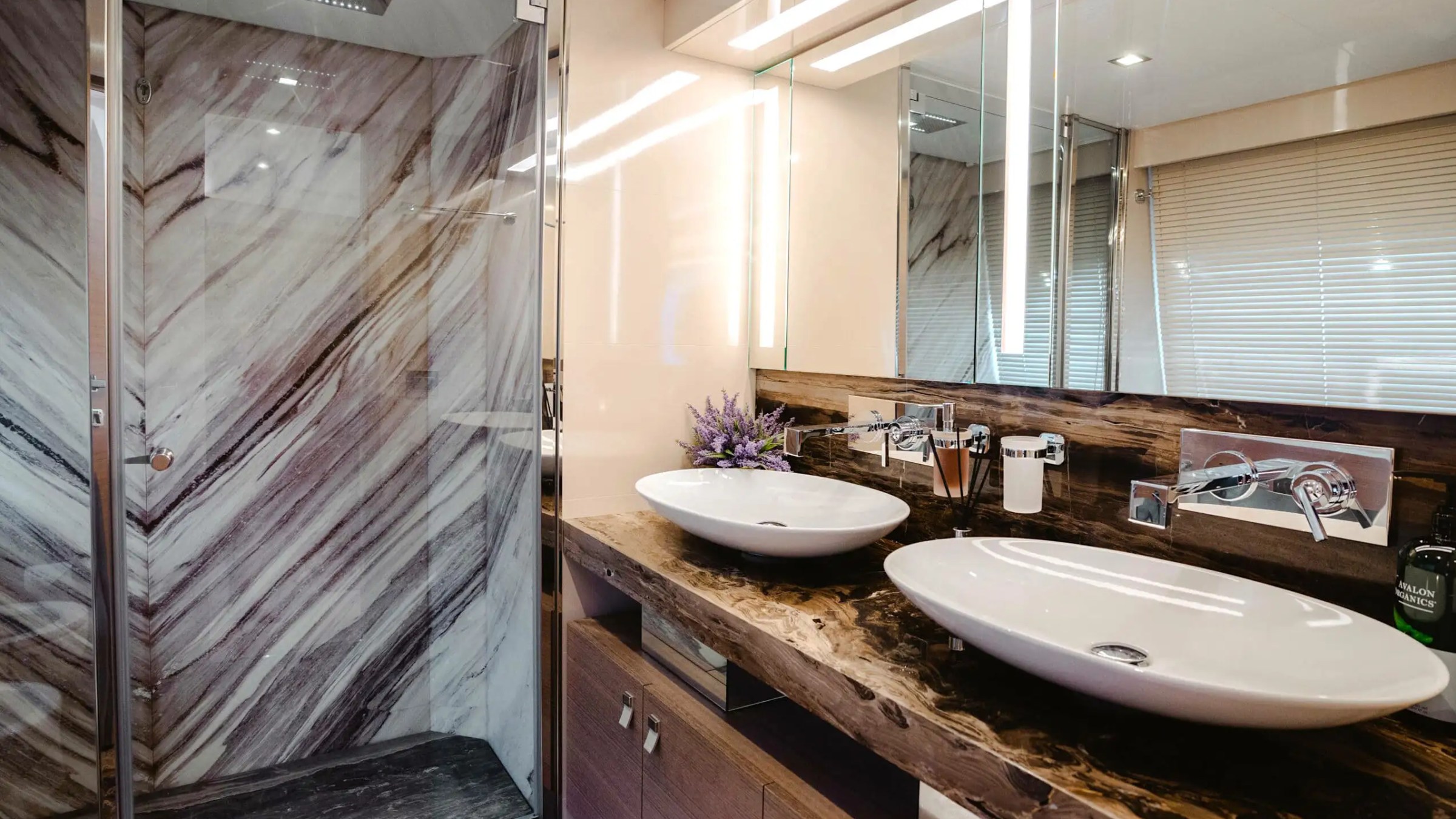 Bathroom vanity area on 95′ Custom Line Miami