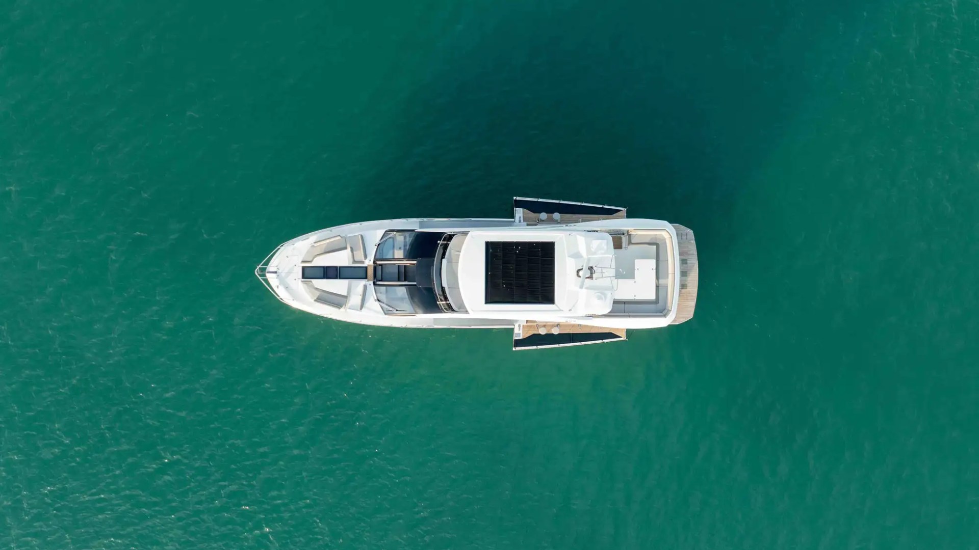 68' Galeon yacht charter Miami Beach aerial top-down drone view