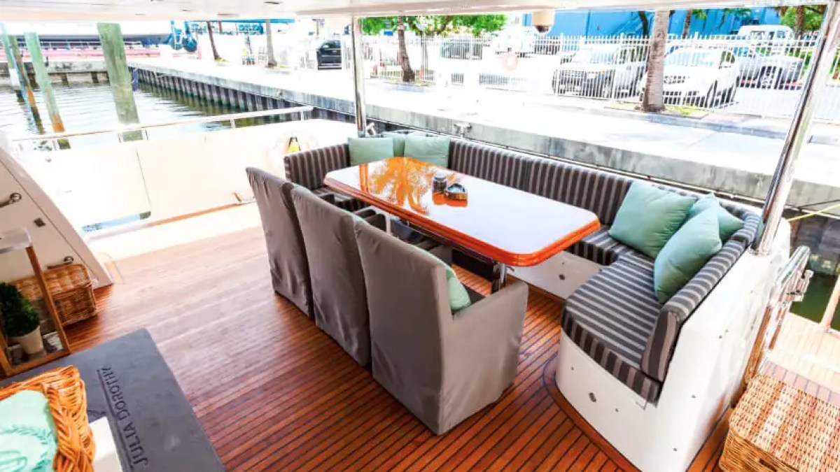 Aft deck lounge seating on 103′ Johnson Key Biscayne