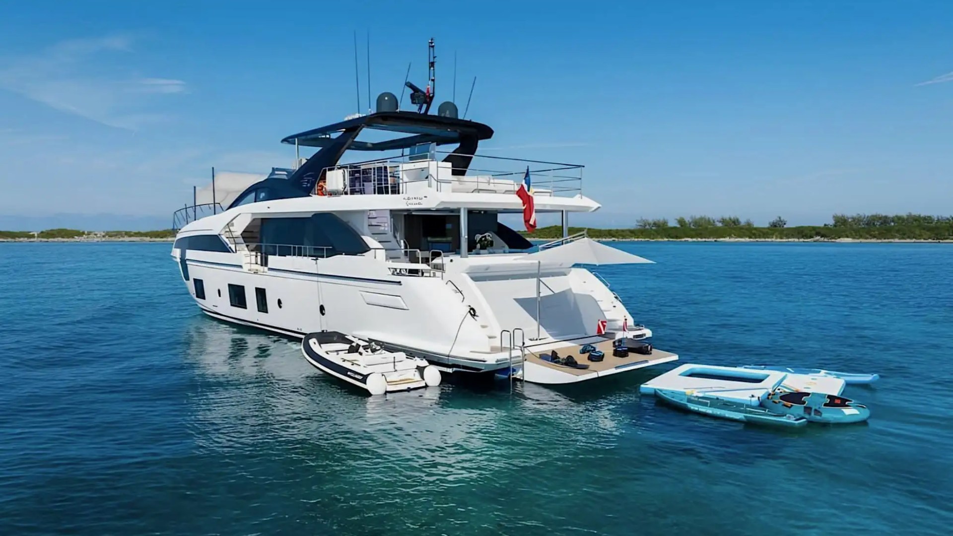 Side-profile drone shot of 88′ Azimut underway
