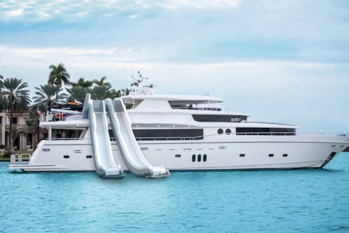 Giant inflatable slide from the yacht on 103′ Johnson Key Biscayne