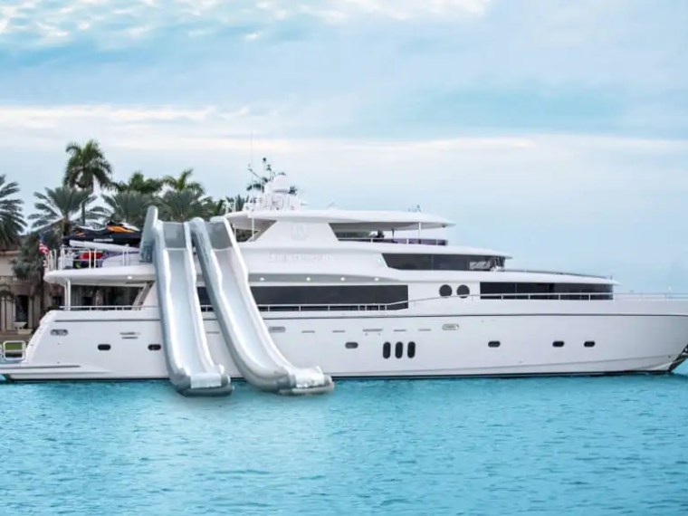 Giant inflatable slide from the yacht on 103′ Johnson Key Biscayne