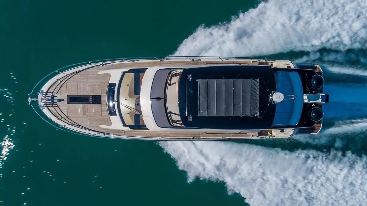 Drone cruising view of 62′ Beneteau yacht underway near Miami Beach