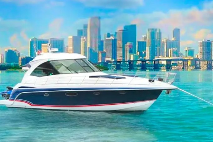 48′ Formula boat drone overhead anchored near sandbar