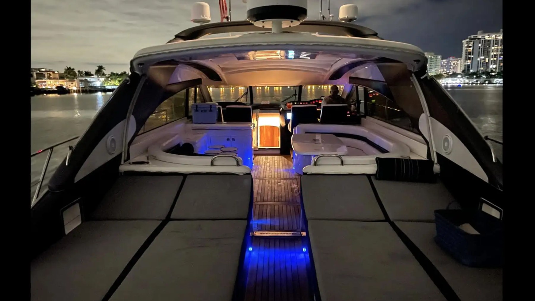 70' Princess yacht charter cockpit lounge night Miami skyline