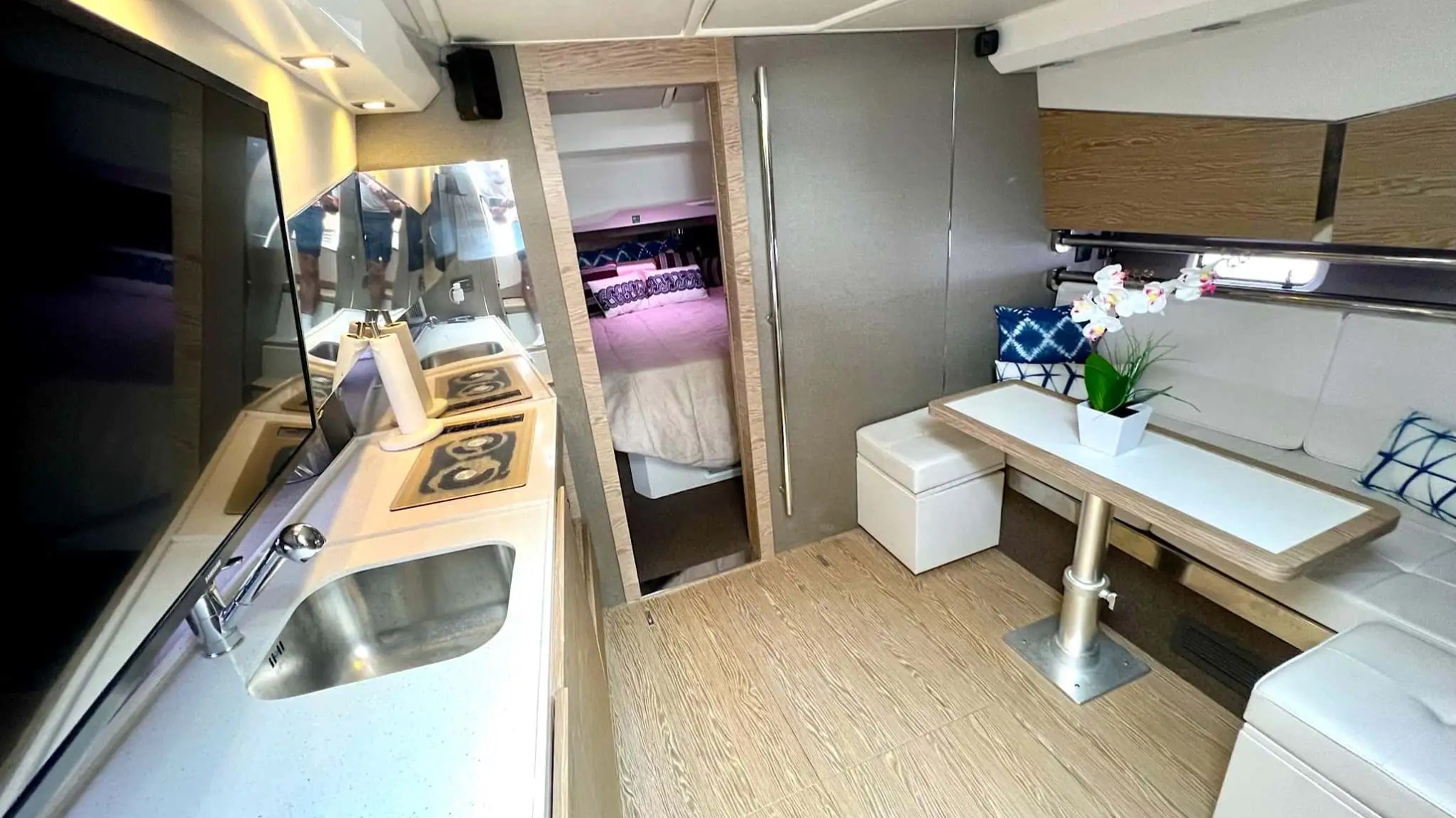 Interior salon with panoramic windows aboard 42′ Azimut