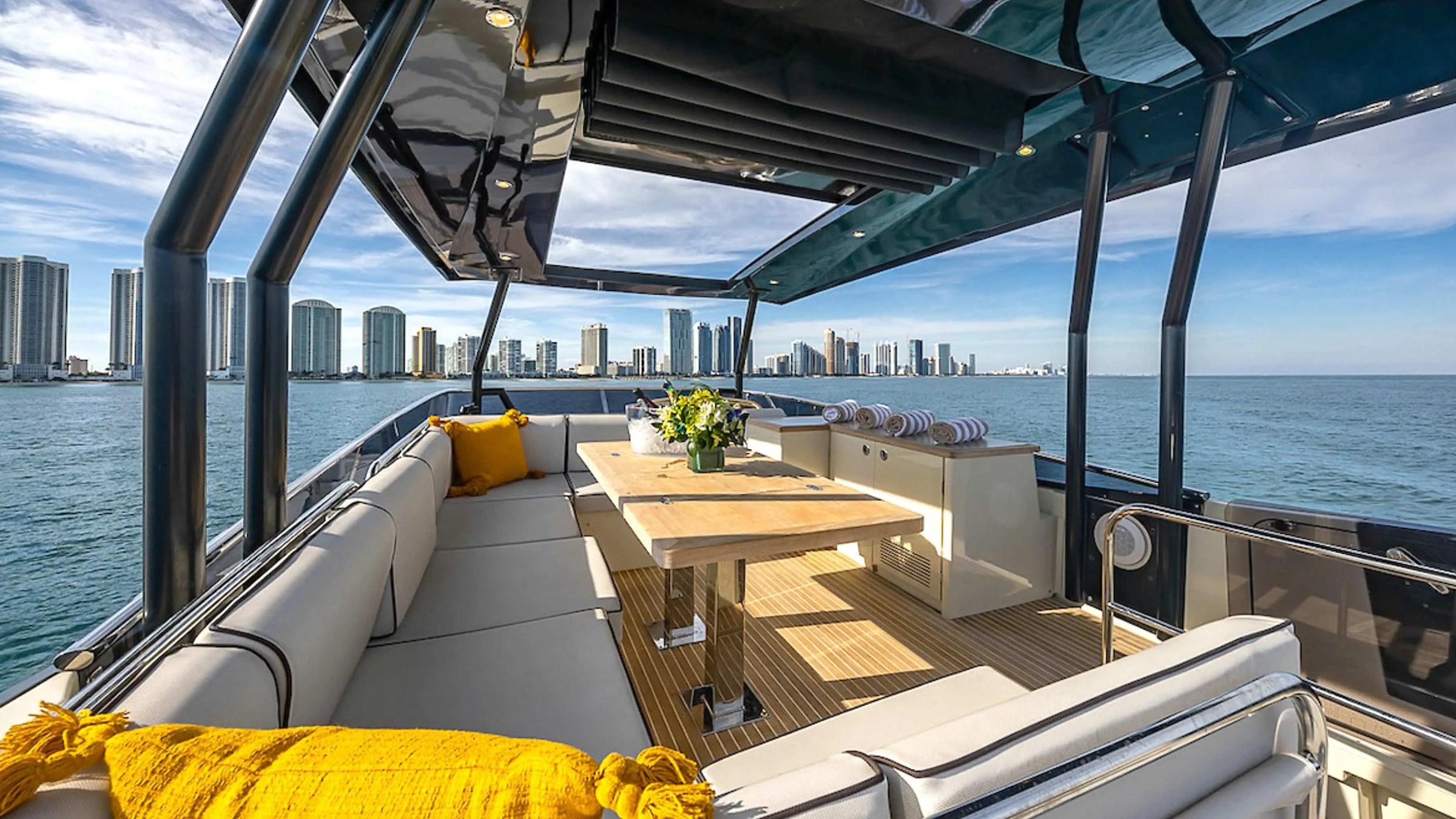 Flybridge seating and table on 62′ Beneteau yacht in Miami Beach