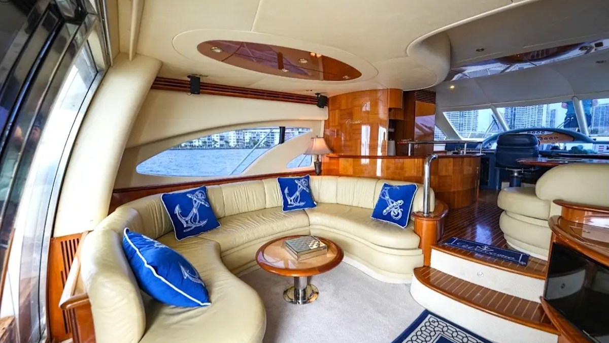 Indoor dining table on 70′ Azimut Miami