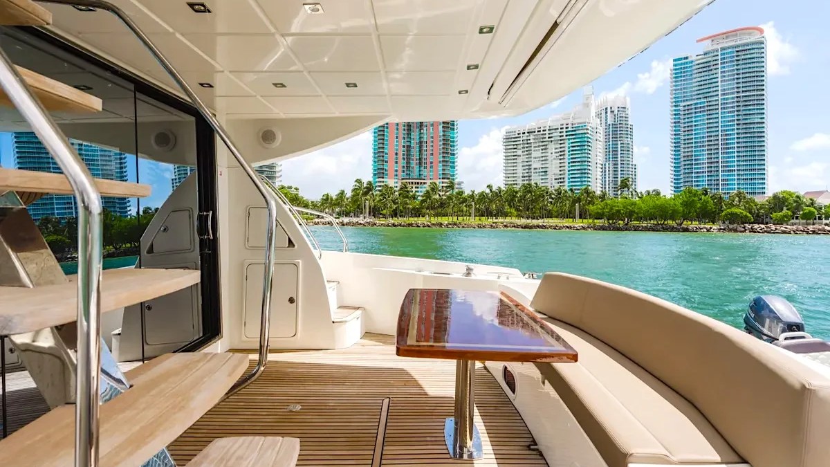 Aft deck seating on the 62′ Prestige luxury yacht rental in Miami Beach