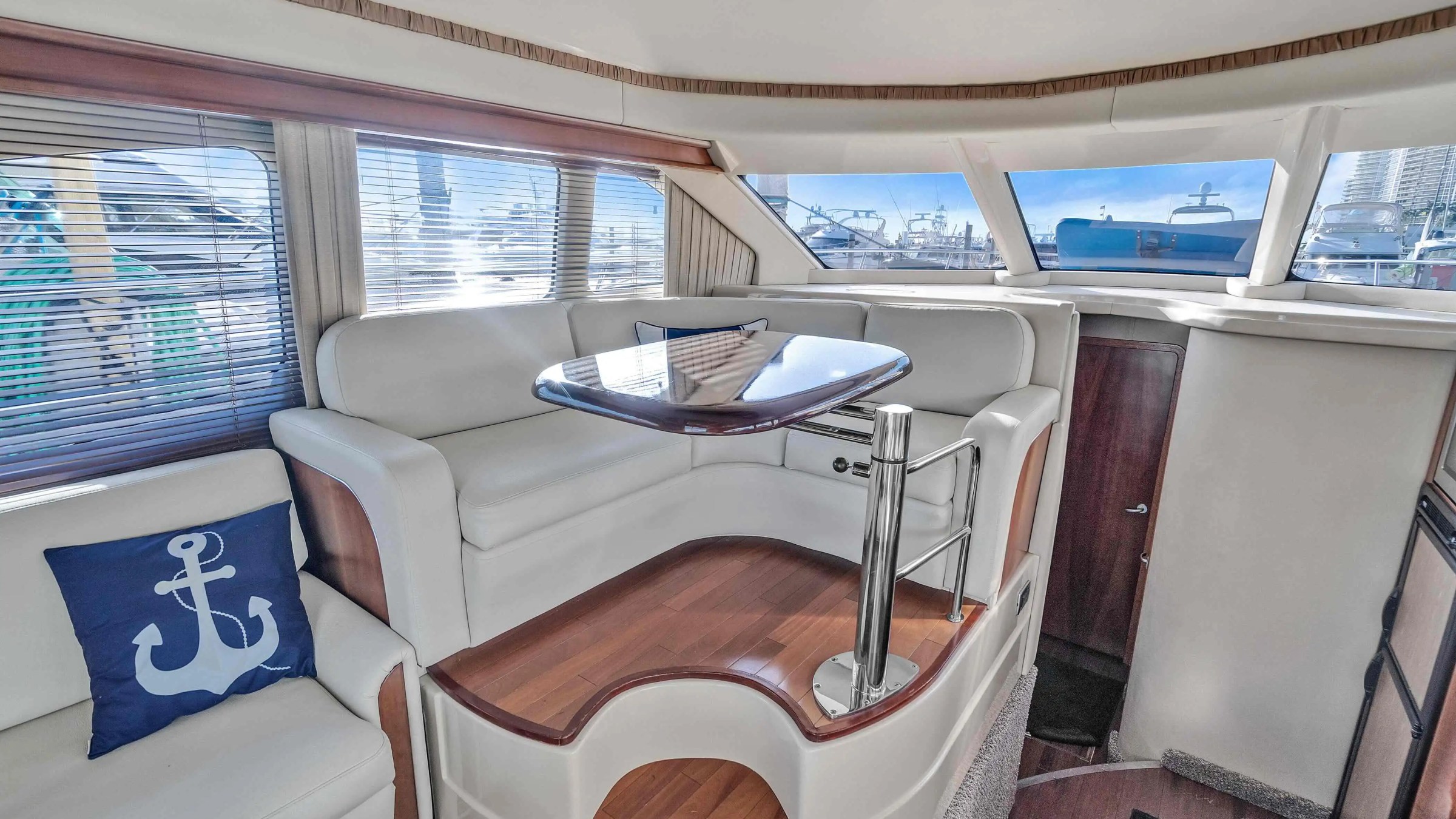 Galley and dining area on 50′ Sea Ray Miami