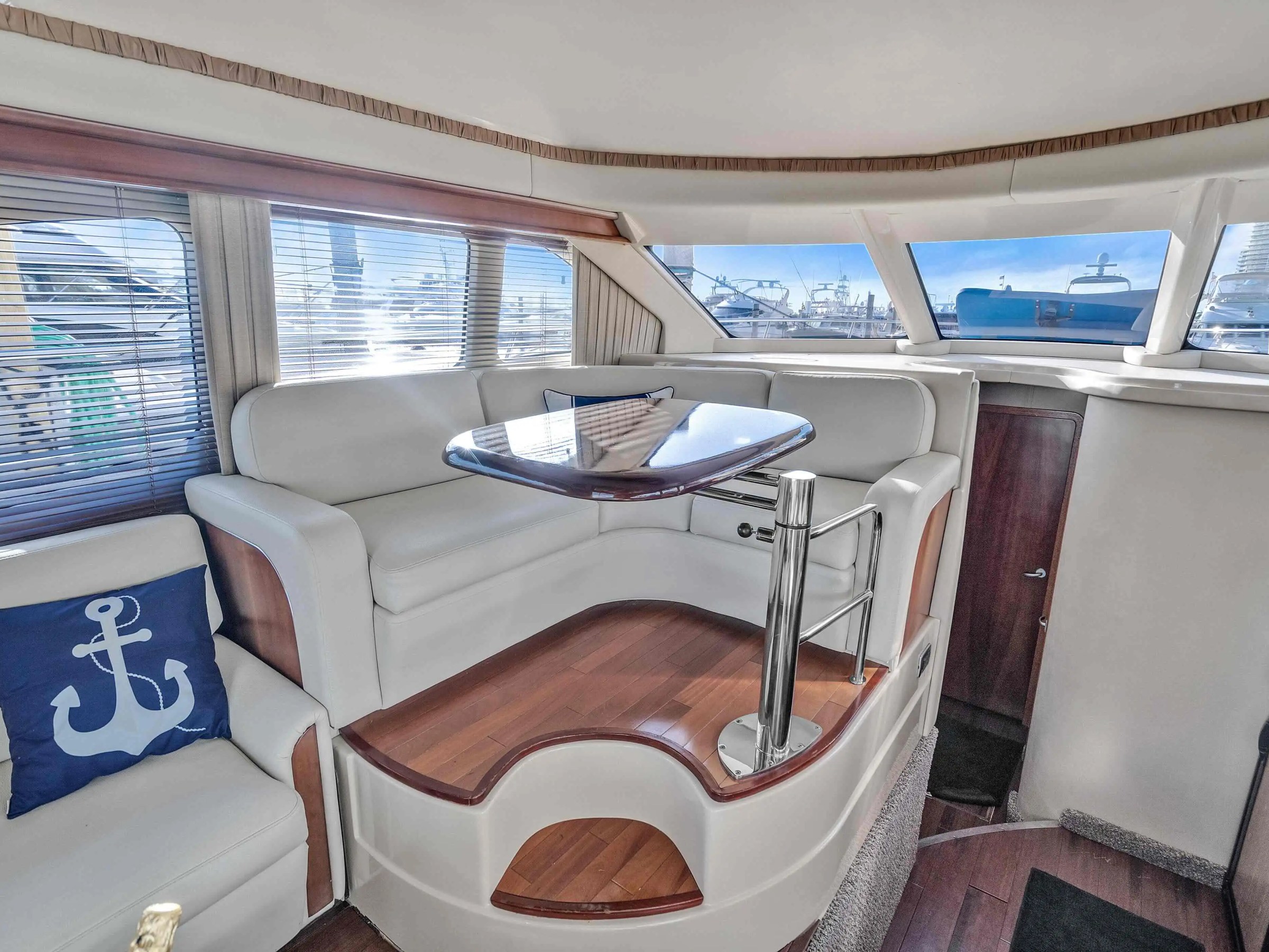 Galley and dining area on 50′ Sea Ray Miami