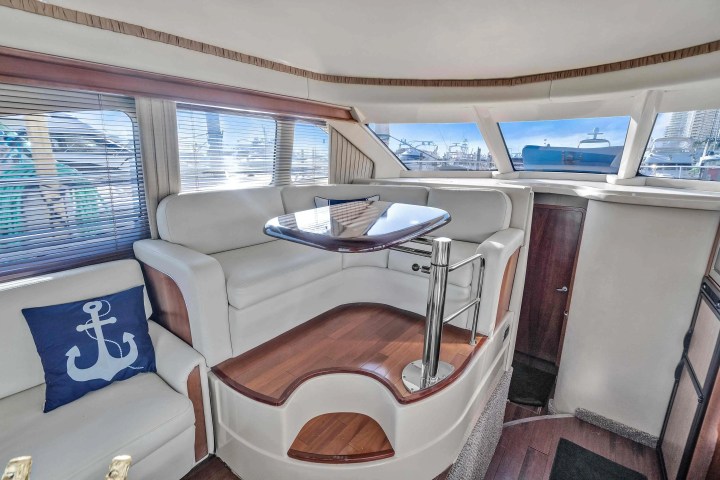 Galley and dining area on 50′ Sea Ray Miami