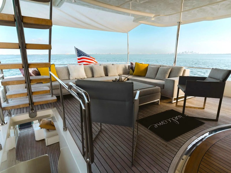 Aft deck lounge on 95′ Custom Line Miami