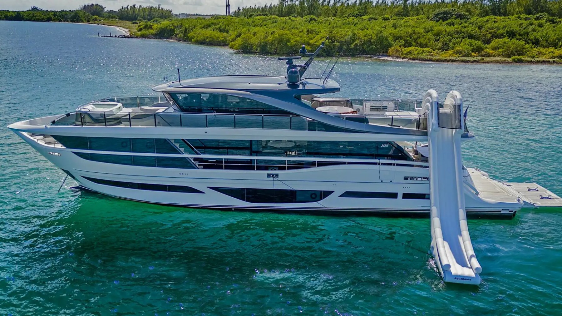 Aerial side pass of 100′ Princess Miami