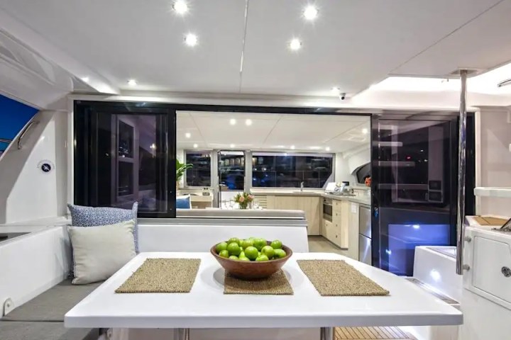 Cozy interior seating nook with ocean light