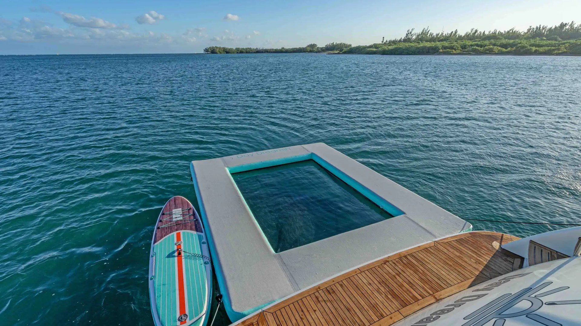 90' Azimut yacht charter floating dock paddleboard Miami Beach Biscayne Bay