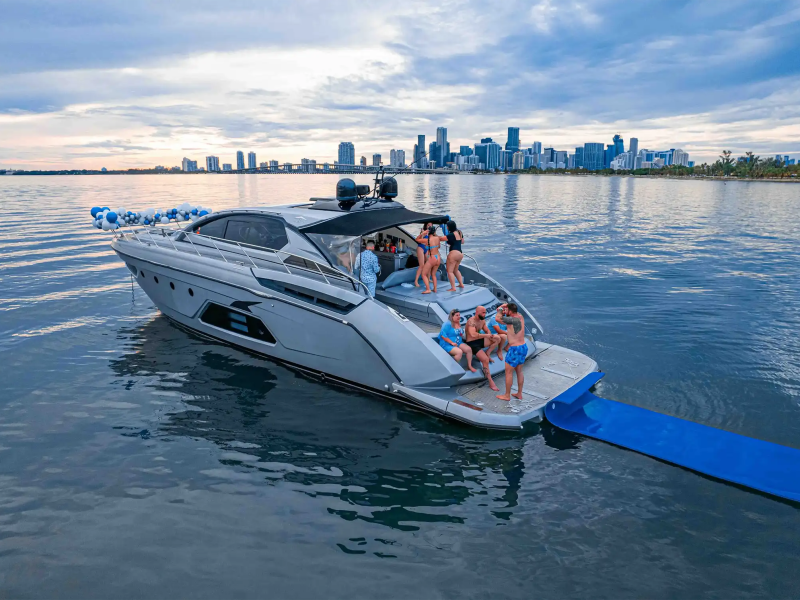 Yacht anchored with magic carpet platform on 64′ Atlantis Miami