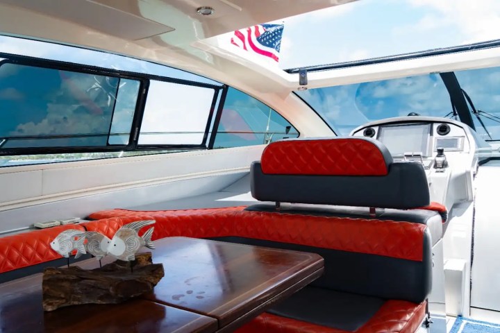 64′ Atlantis side‑profile cruising Miami – image 10