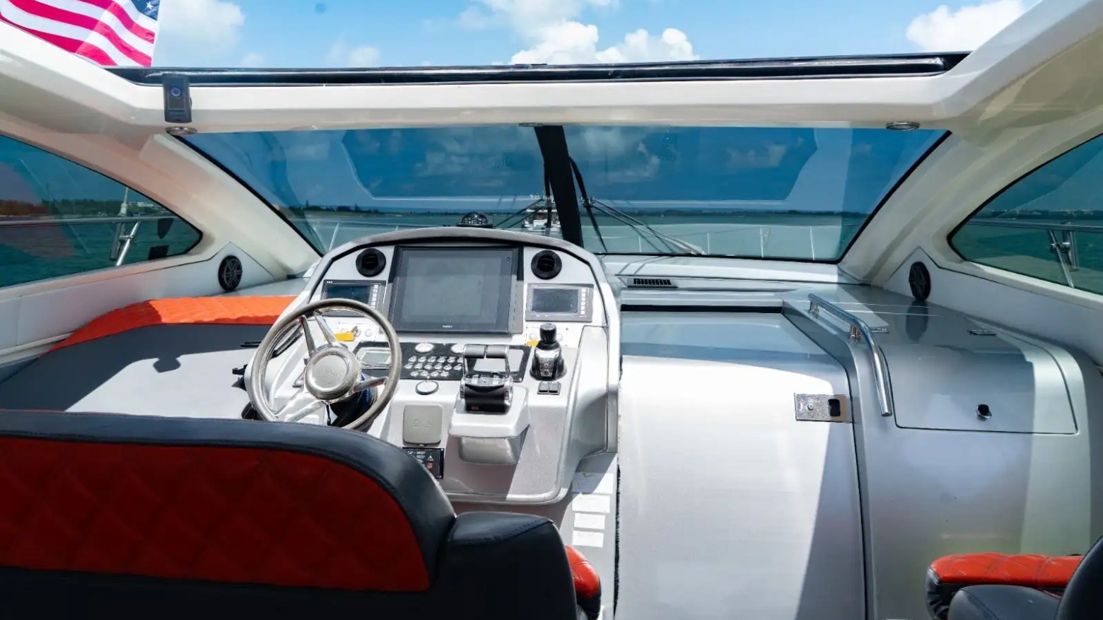 Interior helm station on 64′ Atlantis Miami