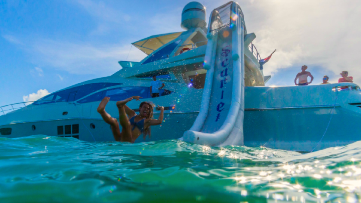 Giant slide next to 103′ Azimut Miami
