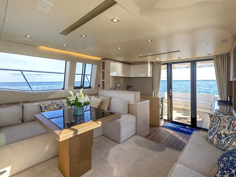 62′ Beneteau yacht interior salon with panoramic windows