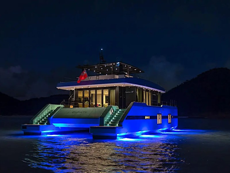 70' Sunreef yacht charter night view blue underwater lights